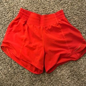 Lululemon red running shorts.